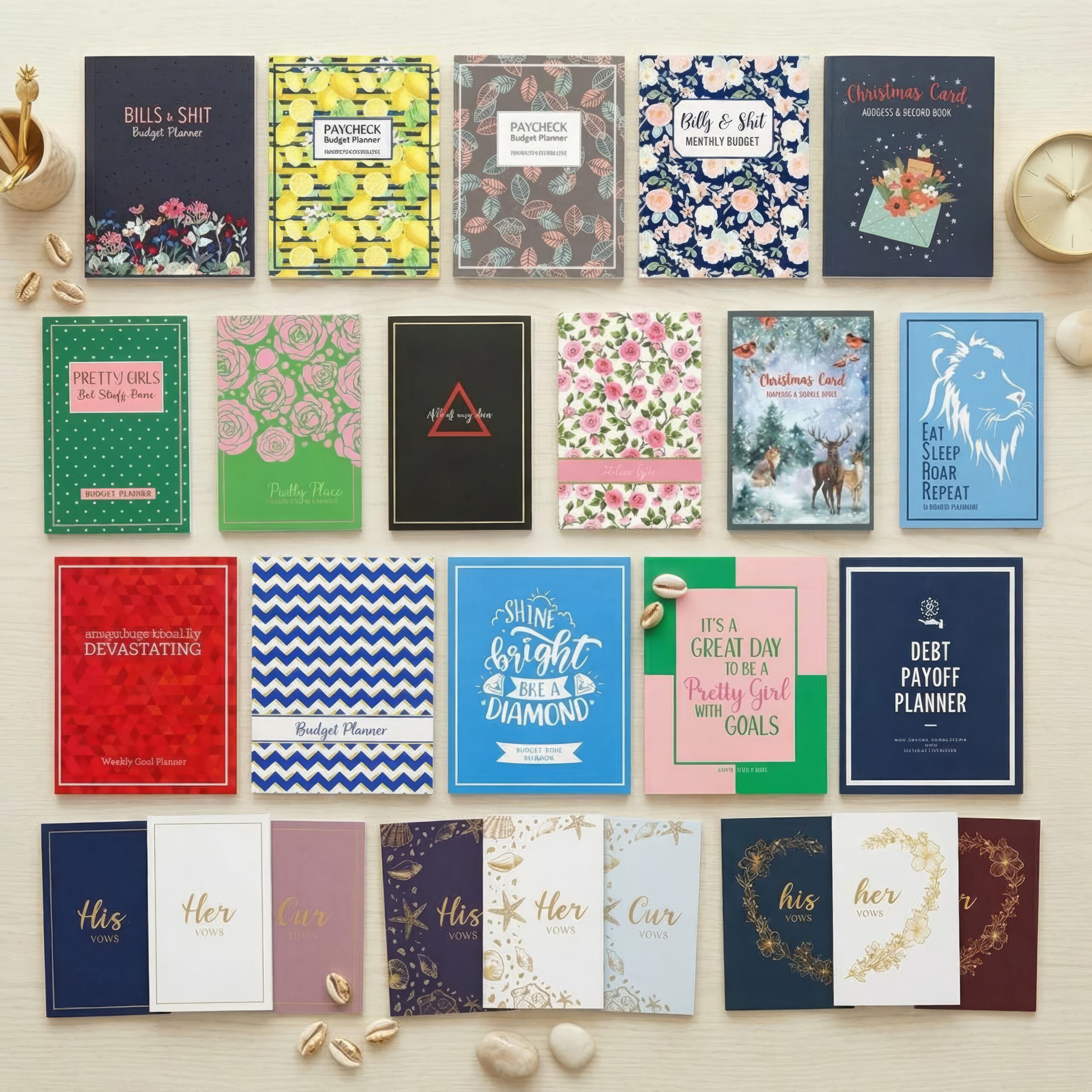 Assorted planners and journals displayed on a cream colored table